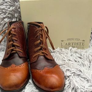 Beautiful boots. Never worn. With box. Size on box says 9.5-10